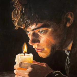 In The Dark (2025) by Ben Young A young man gazes intently at a flickering candle, his face illuminated by its warm glow in a powerful study of light, focus, and introspection.