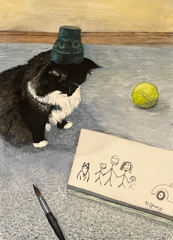 This watercolor painting depicts a black and white cat wearing an upside-down green water cup on its head, sitting beside a tennis ball and a painting of a stick-figure family, with a paintbrush resting nearby.